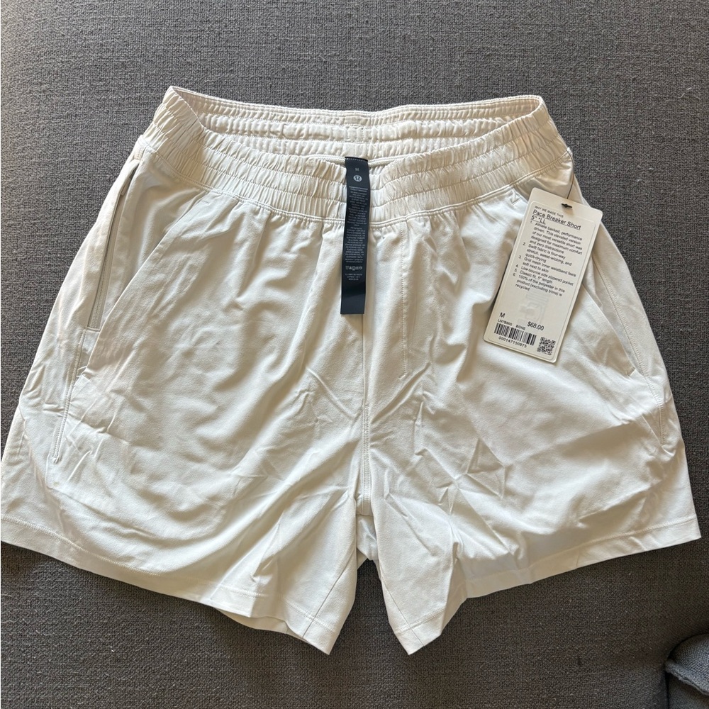 Men’s Lululemon Pace Breaker Linerless Short 5" 
Color Bone New with tags medium